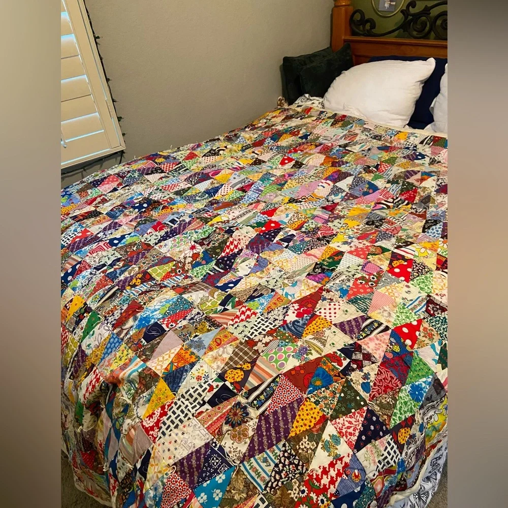 Vintage hand made quilt triangular fabric with solid reverse side